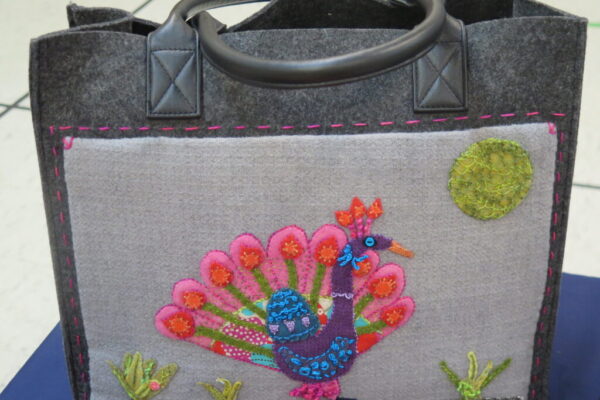 Peacock on a Bag by Pat White. Sue Spargo Design adapted