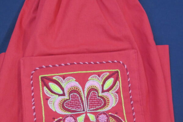 In the Pink- apron by Janet Sunderani. Glazig embroidery. Pascal Jouen design